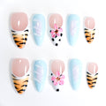 Faux ongles en amande faits main Nailsynth – Bleu pastel, imprimé floral et tigre, lot de 10 pièces avec colle à ongles, bâton de manucure et lime à ongles inclus