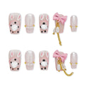 Faux ongles à coller Nailsynth – Adorables breloques 3D en forme de lapin et de nœud avec perles et paillettes, lot de 10 faux ongles tendance, adhésif, bâton de manucure et lime à ongles inclus.