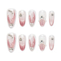 Faux ongles à coller Nailsynth – Élégants reflets or rose avec des touches florales et nacrées en 3D, lot de 10 faux ongles tendance, adhésif, bâton de manucure et lime à ongles inclus.